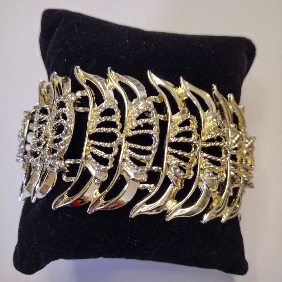 Soft Gold Tone Intrique Bracelet 6$